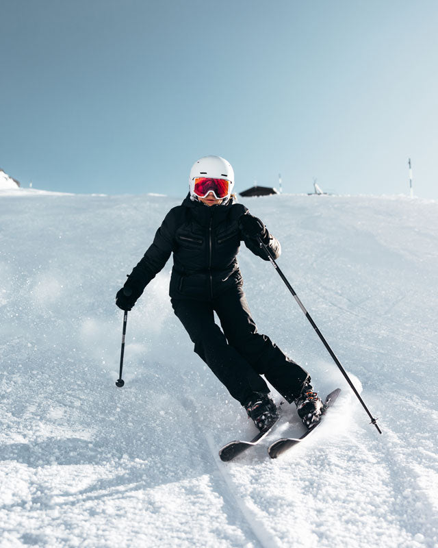 Skier riding in Deer Valley on a ski rental from Skis on the Run.