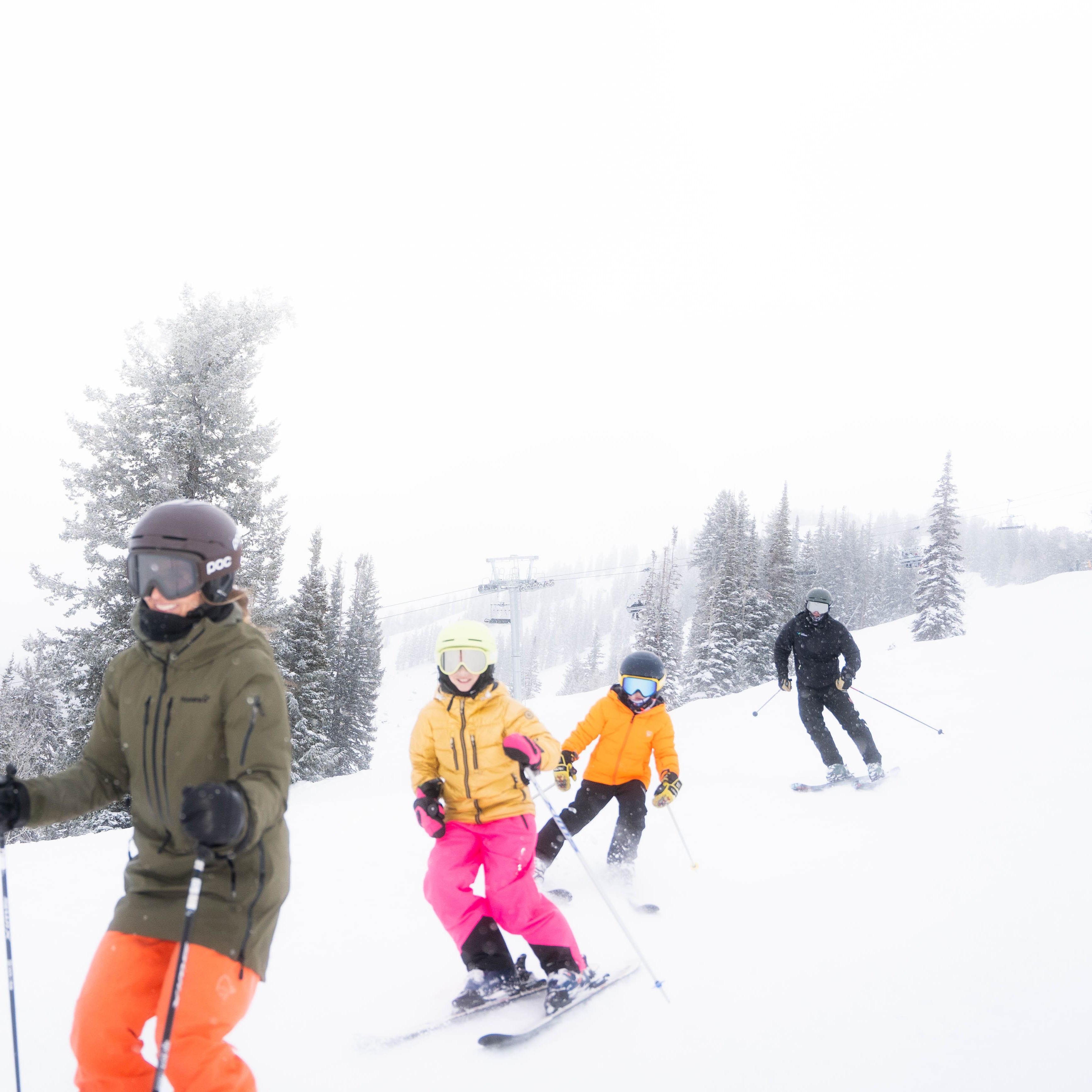 Family skiing on their Skis on the Run ski rentals at Solitude Mountain Resort