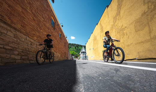 Two riders in Park City on their bike rentals from Skis on the Run