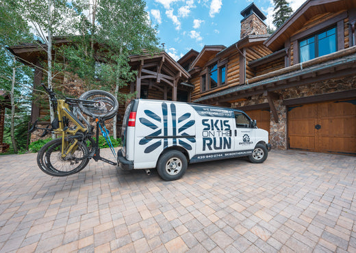 Skis on the Run van delivering a bike rental in Deer Valley