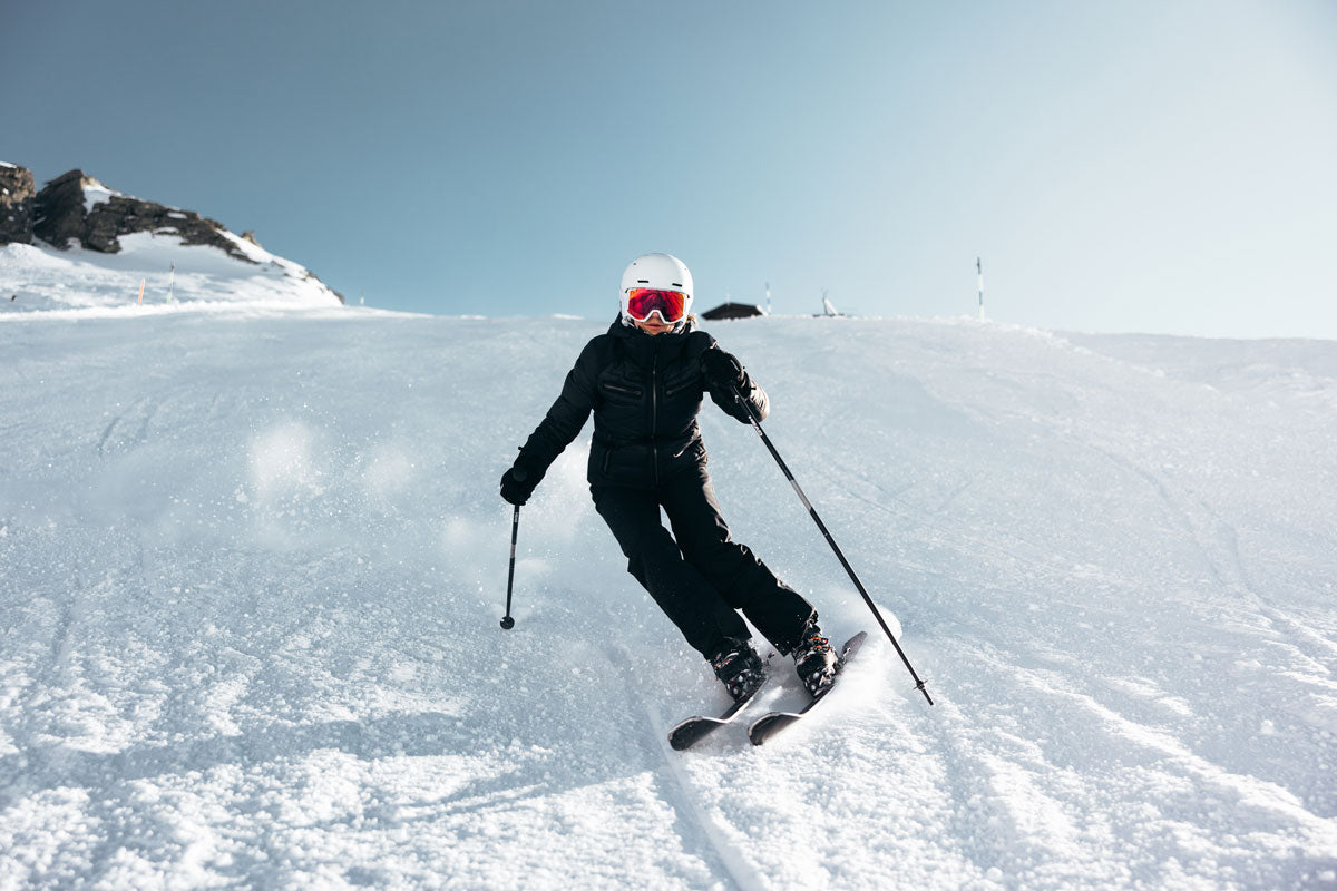 Skier riding in Deer Valley on a ski rental from Skis on the Run.