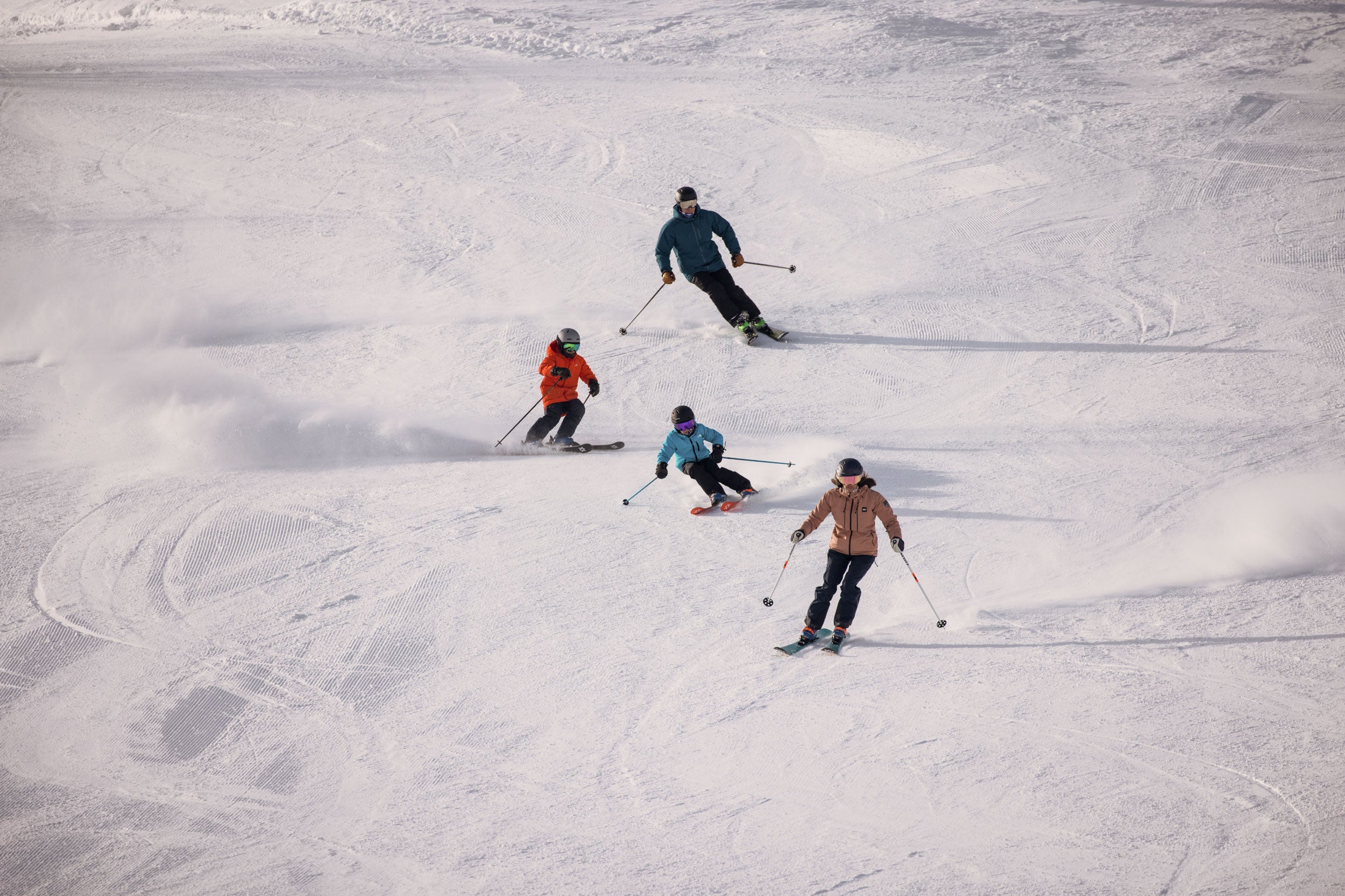 Family skiing in Park City on their ski rentals from Skis on the Run